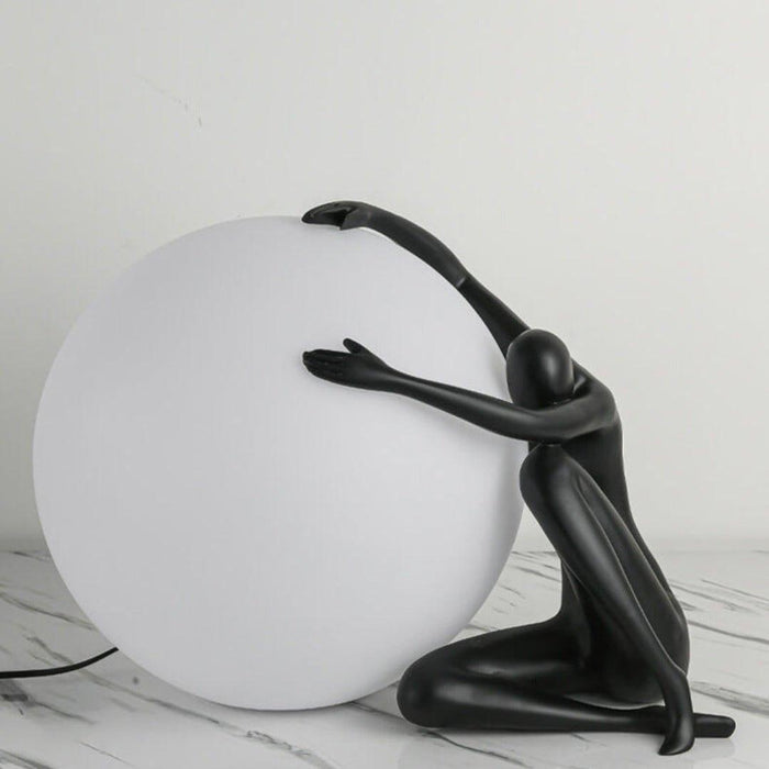 Humanoid Ball Holding Table Lamp - DWHOME