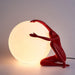 Humanoid Ball Holding Table Lamp - DWHOME