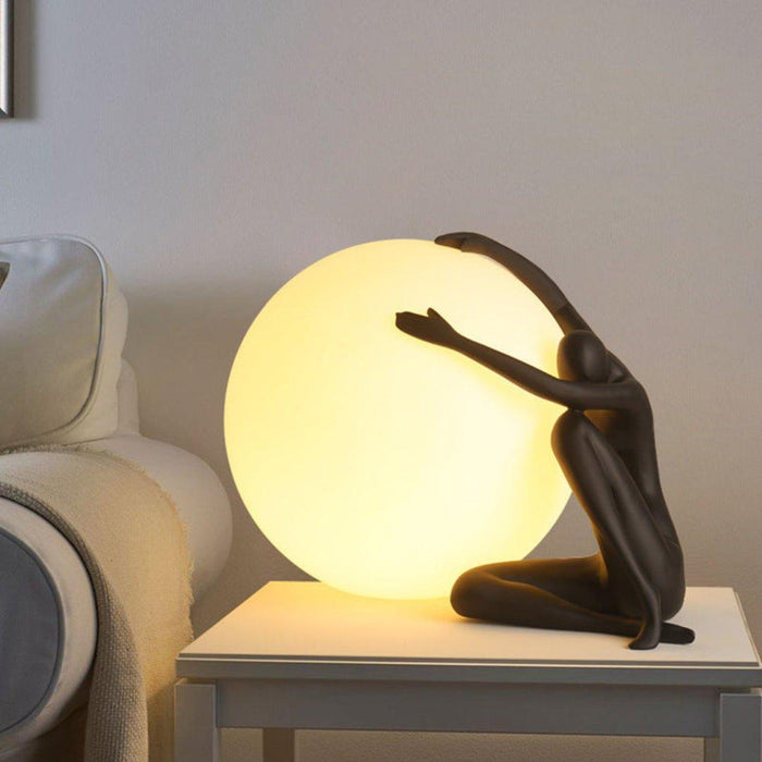 Humanoid Ball Holding Table Lamp - DWHOME
