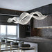 Modern Wave Crystal Chandelier Over Dining Table - DWHOME