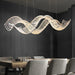Modern Wave Crystal Chandelier Over Dining Table - DWHOME