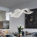 Modern Wave Crystal Chandelier Over Dining Table - DWHOME