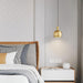 Lampe à suspension en laiton Palla - DWHOME