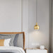 Lampe à suspension en laiton Palla - DWHOME